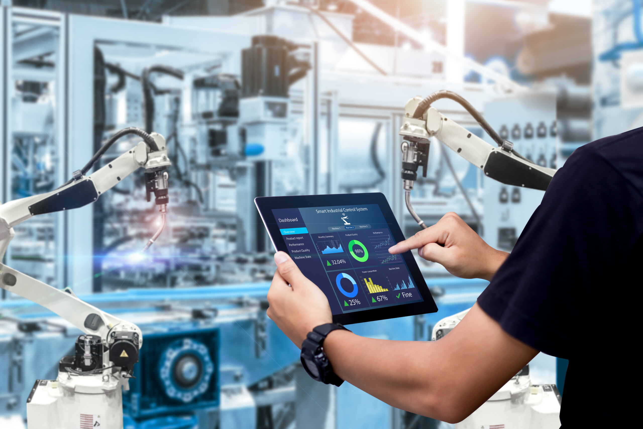 Smart industry control concept.Hands holding tablet on blurred a Invest North – Innovation